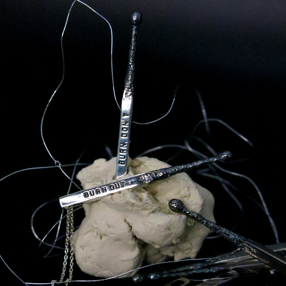 Silver pendant "Match"