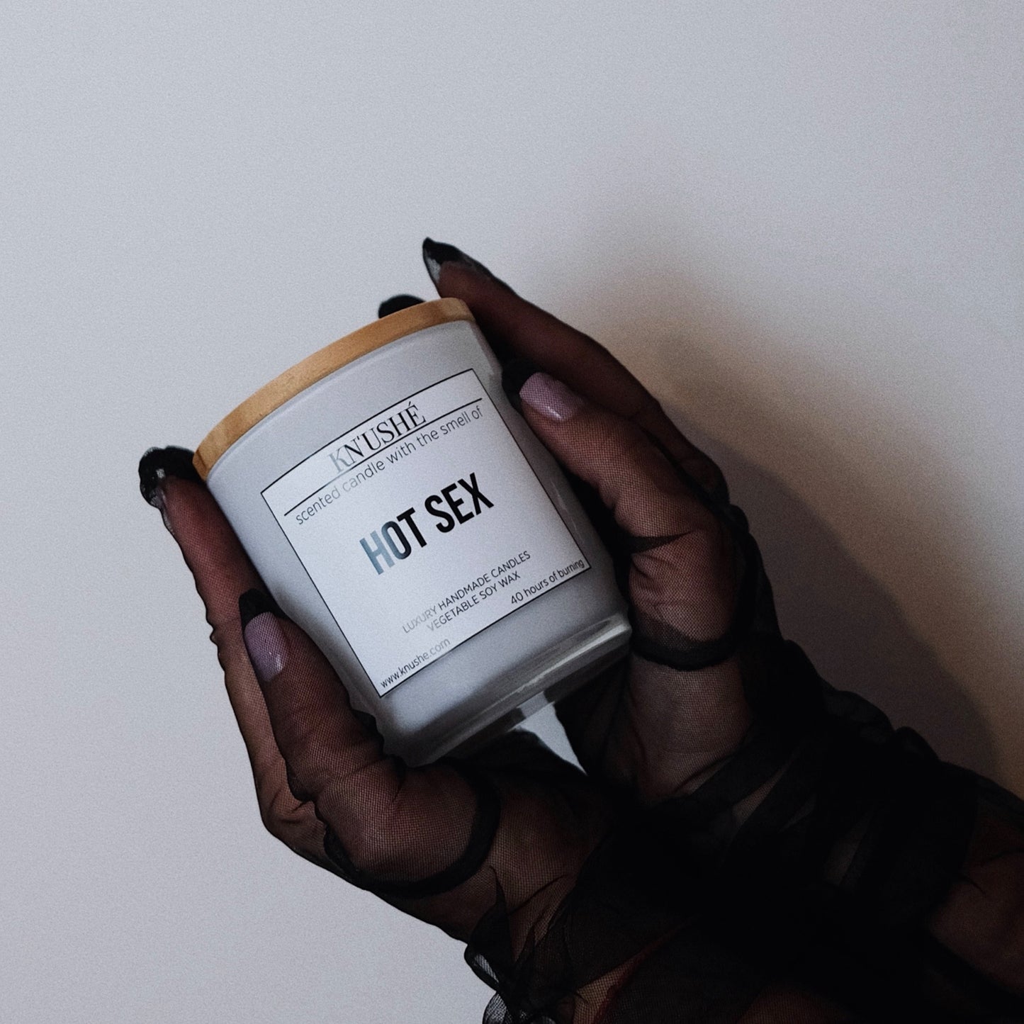 Scented candle with the smell of "HOT SEX"