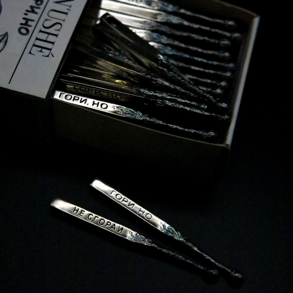 Silver pendant "Match"