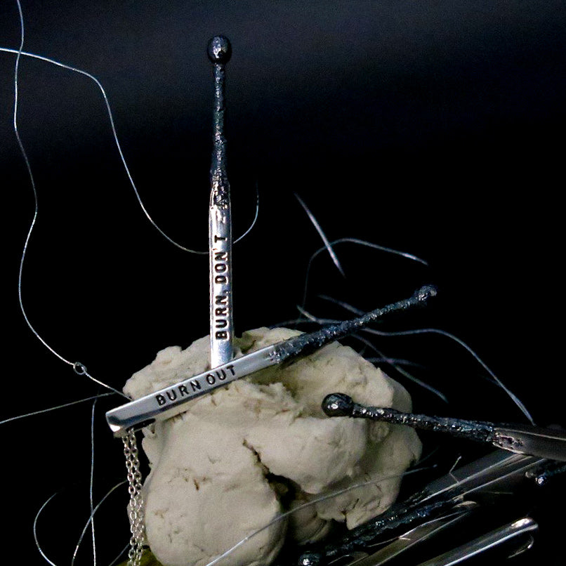 Silver pendant "Match"