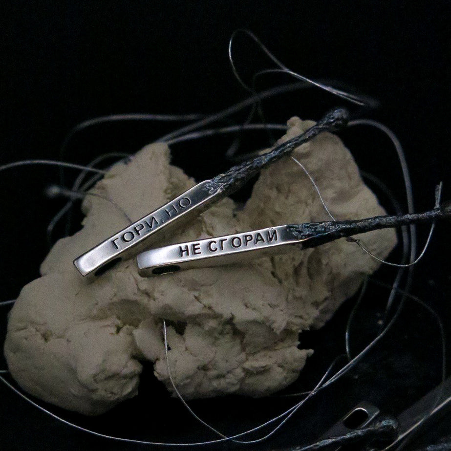 Silver pendant "Match"