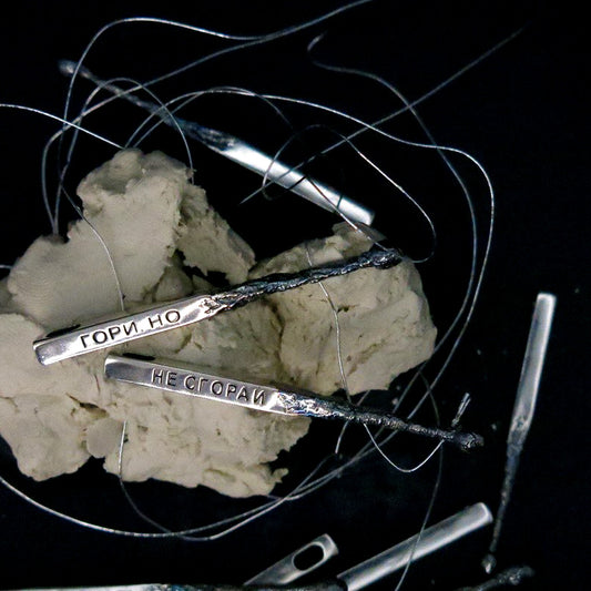 Silver pendant "Match"