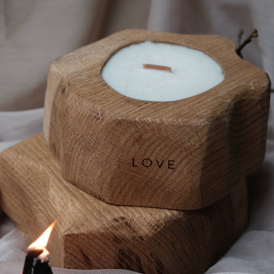 Exclusive aromatic candle in a wooden oak candlestick and a crackling wooden wick - LOVE.