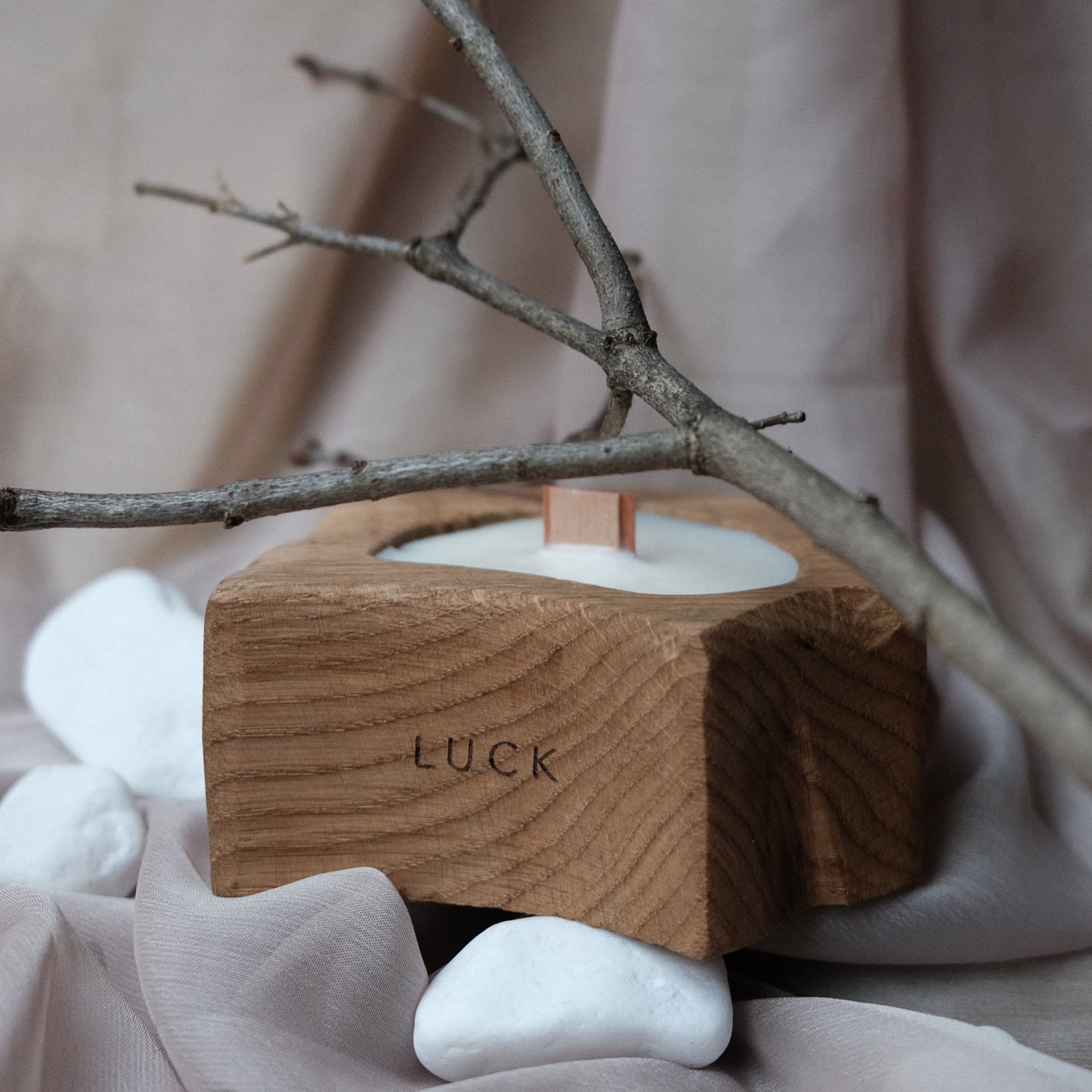 Exclusive aromatic candle in a wooden oak candlestick and a crackling wooden wick - LUCK.